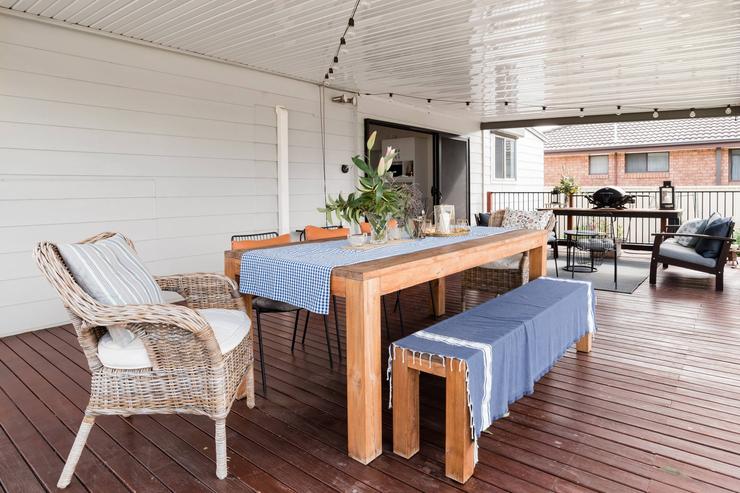 Deck view over the fully fenced backyard at Flamingo House