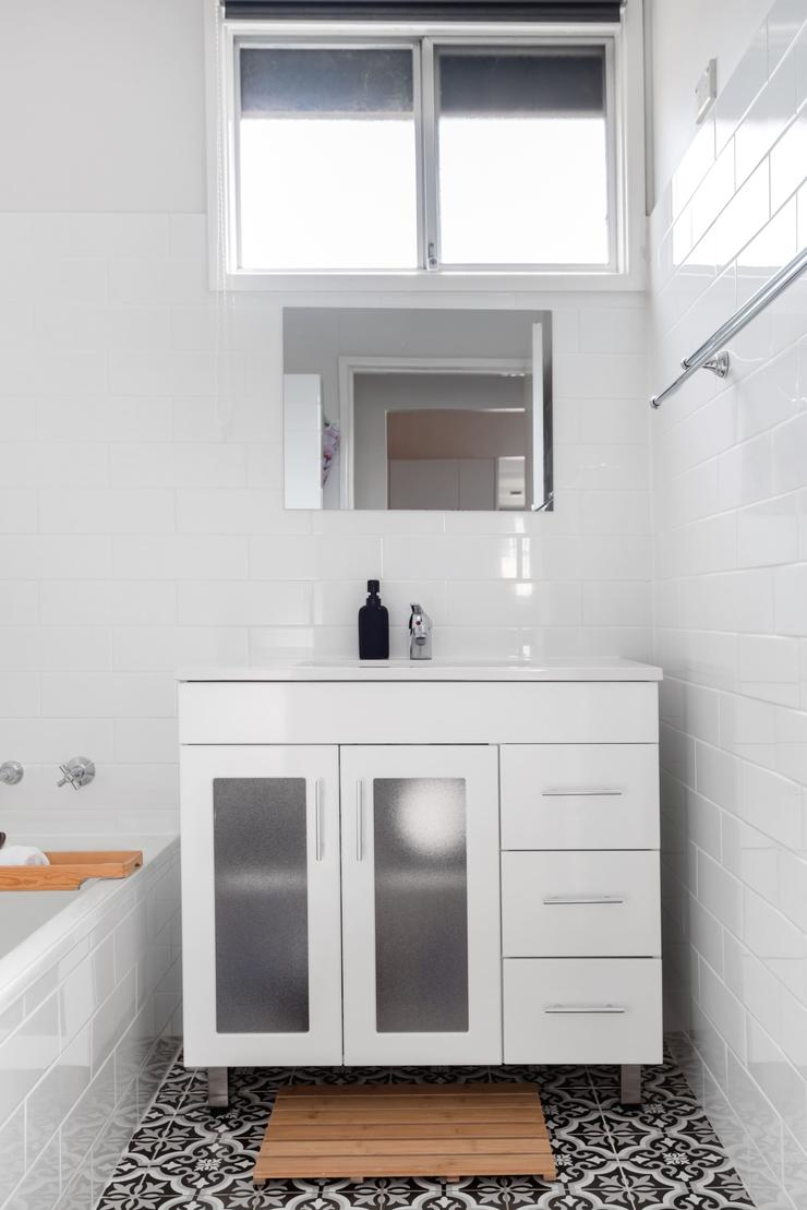 Vanity with mirror and complimentary toiletries in the bathroom