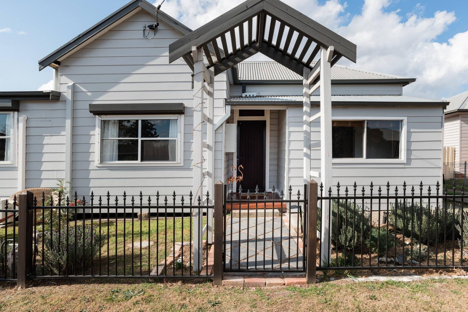 Exterior of Flamingo House, a restored miner’s cottage in Cessnock, Hunter Valley